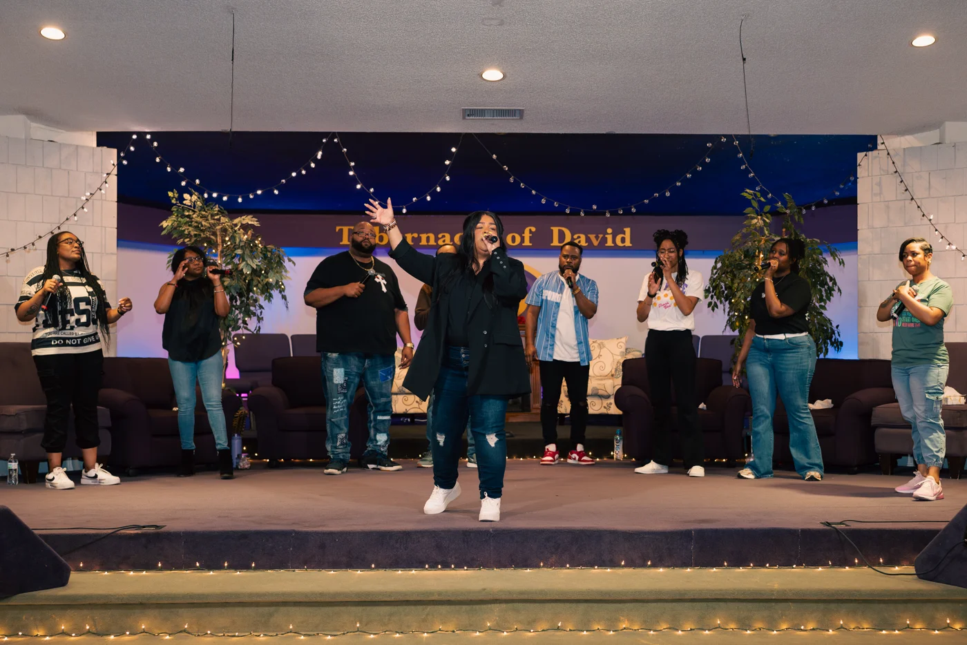 T.L.C.W.E. worship team gathered together during The Release, Phase 2